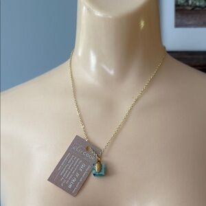 Beautiful necklace with glass piece infused with Isle of Palms SC sand.